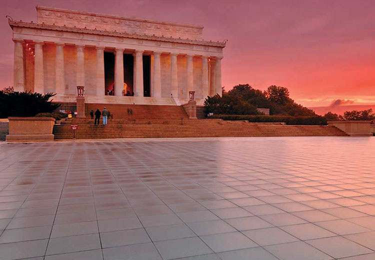 Sunset view of open plaza in front of the Lincoln Memorial in Washington D.C. Hanover Prest Pavers reflect the pink glow of the sunset.