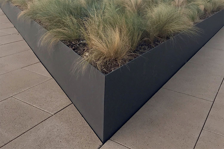 Fused metal Form and Fiber planter box with native California plants inside